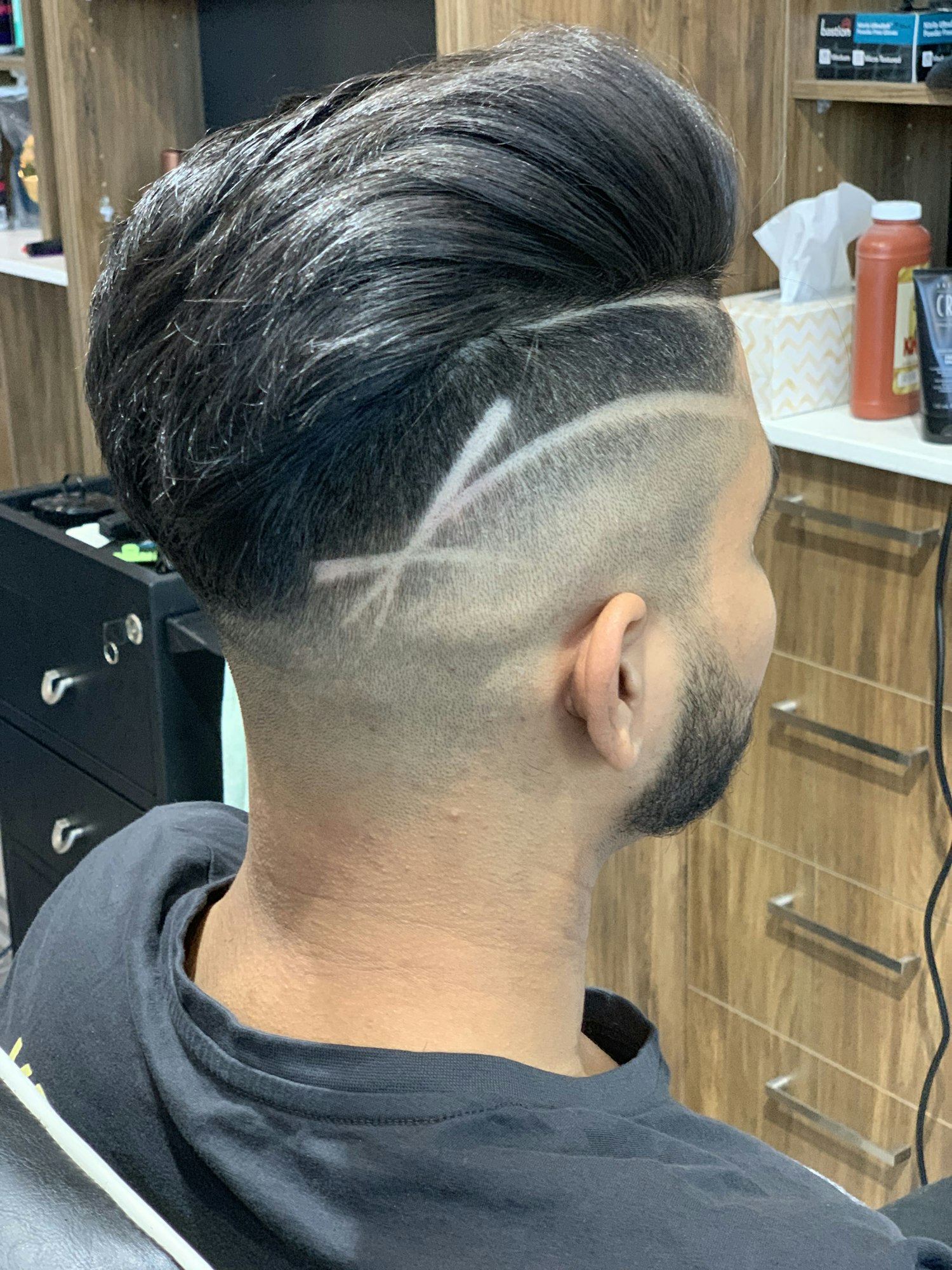 Haircut with a shaved design