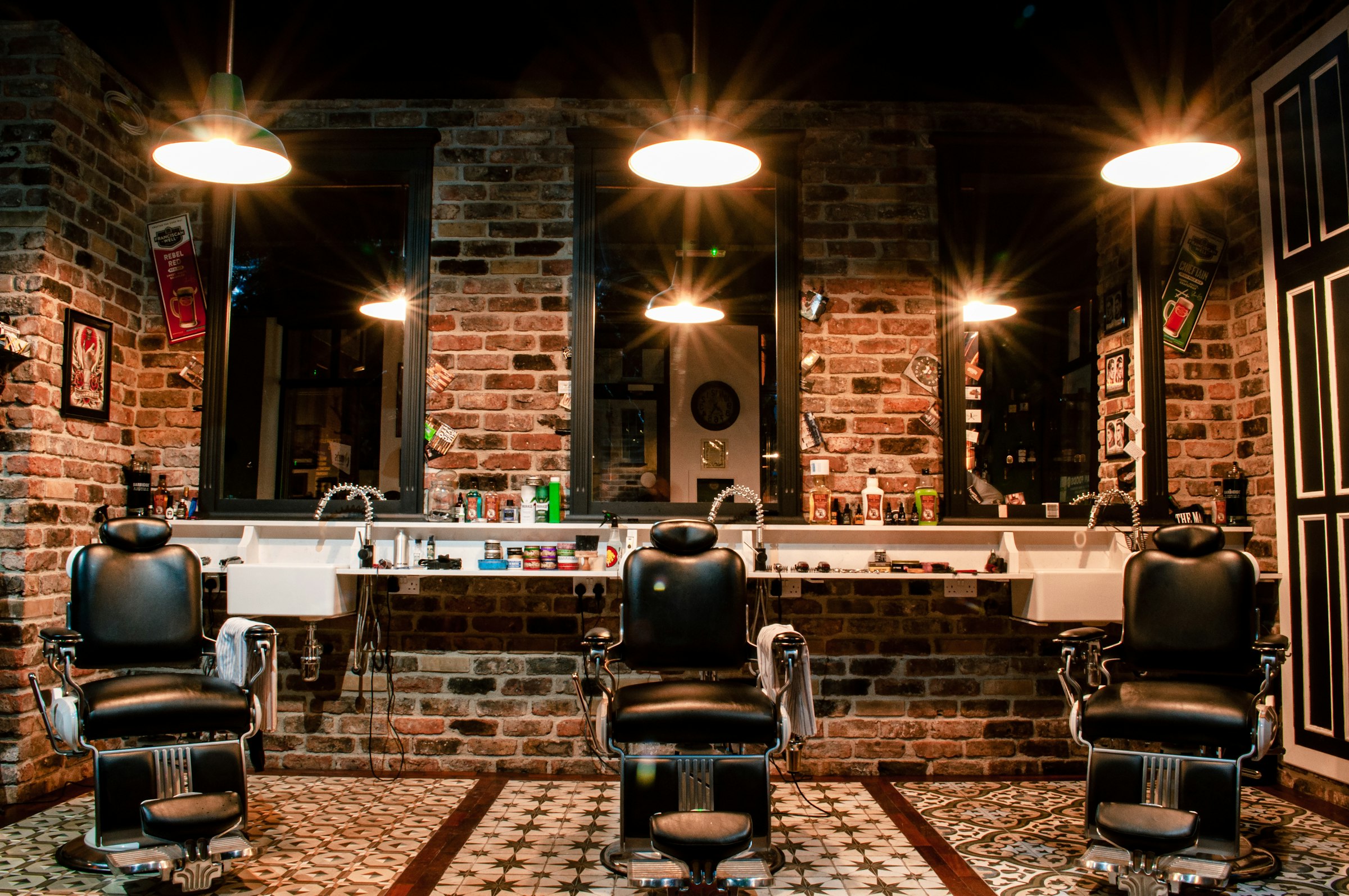 Barbershop interior with chairs and brick walls